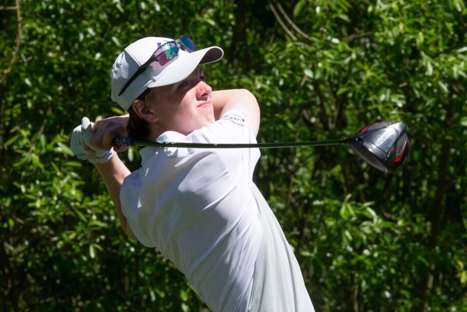 South Eugene&#39;s Owen Davis-Piger tees off on the 13th hole during the OSAA Class 6A boys golf state championships at Emerald Valley Golf &amp; Resort in Creswell.