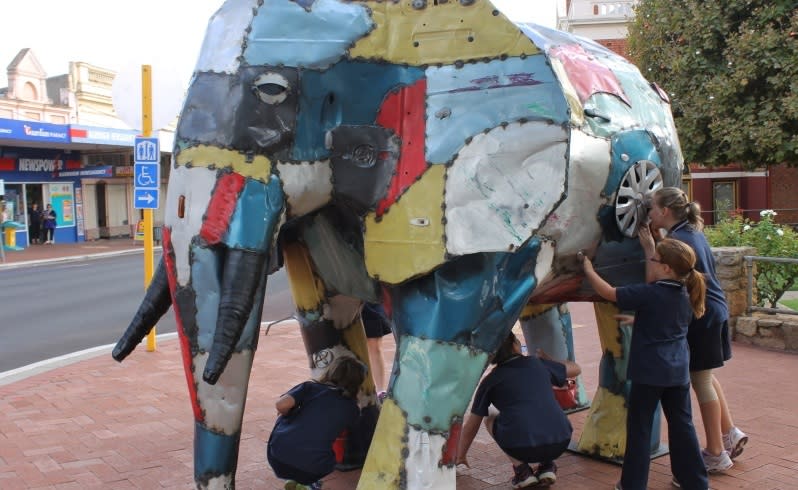 Narrogin students Cassidy Young, 10, Jo Cole, 10, Holly Cole,8, Emma O'Neill, 8 and Caitlyn O'Neill, 10, explore the elephant. Picture: Pia van Straalen