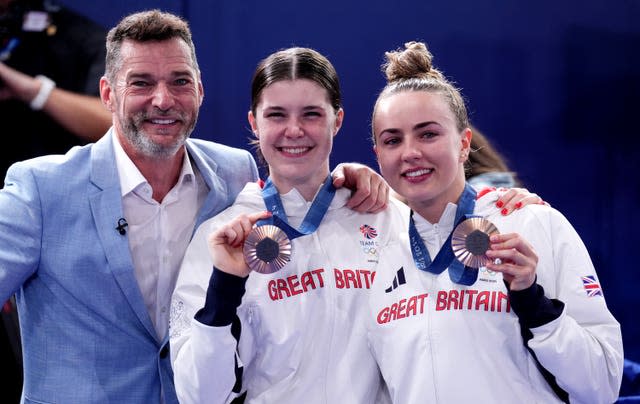 First Dates' Fred Sirieix with his daughter Andrea Spendolini-Sirieix and Lois Toulson, both holding their bronze medals. 