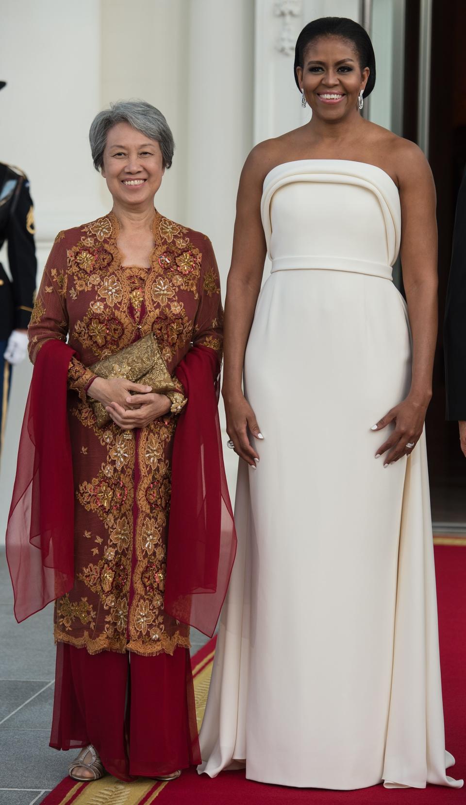 <a href="http://www.huffingtonpost.com/entry/michelle-obama-state-dinner-dress-thumbs-up_us_57a1e18ee4b0e2e15eb7e331">Wearing Brandon Maxwell</a> for a state dinner with Singapore's Ho Ching, wife of Prime Minister lee Hsien Loong in Washington, D.C. on Aug 2.