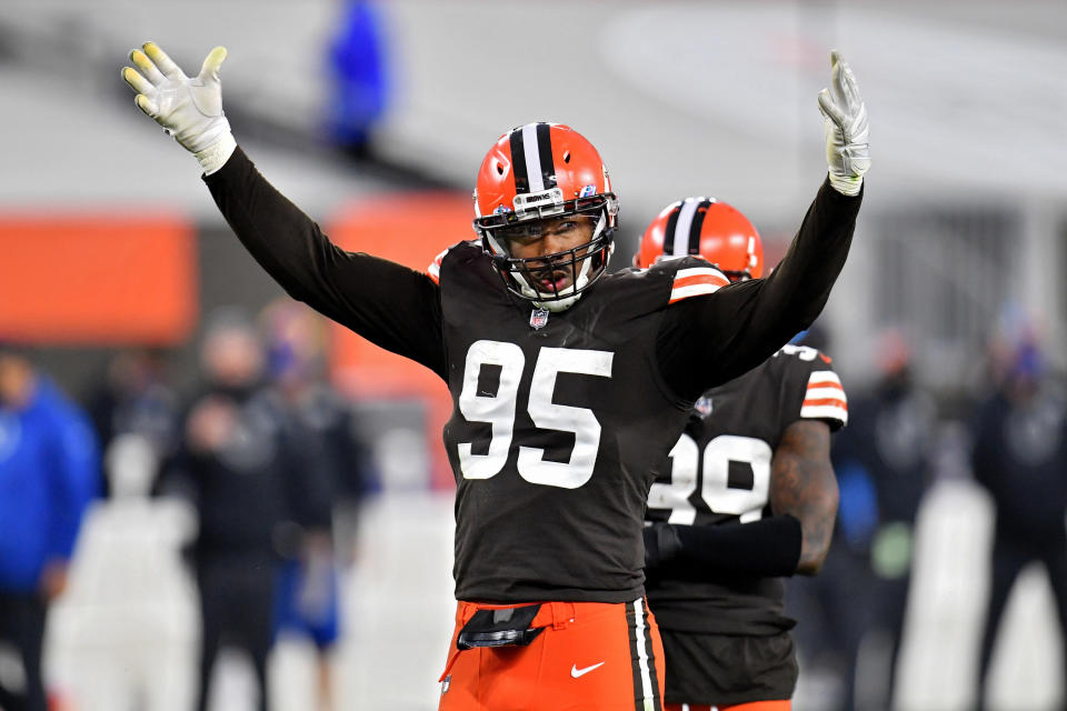 Browns uniforms brown jersey with orange helmet and white lettering