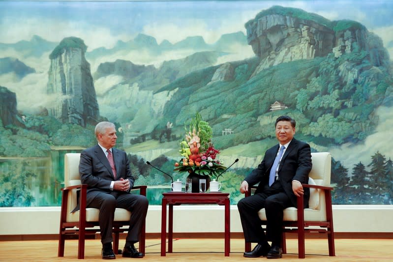 FILE PHOTO: Chinese President Xi Jinping meets Britain's Prince Andrew at the Great Hall of the People in Beijing