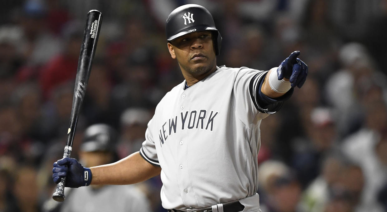 MINNEAPOLIS, MINNESOTA - OCTOBER 07: Edwin Encarnacion #30 of the New York Yankees reacts to a check swing in game three of the American League Division Series against the Minnesota Twins at Target Field on October 07, 2019 in Minneapolis, Minnesota. (Photo by Hannah Foslien/Getty Images)