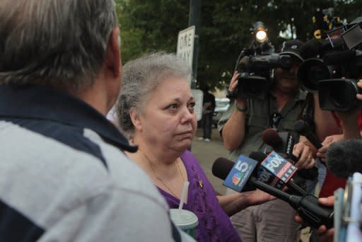 Marcia Savio, mother of Kathleen Savio, the murdered third wife of Drew Peterson, speaks to the media as she returns to court following a recess. Peterson, a former police officer, saw his case finally go to trial Tuesday
