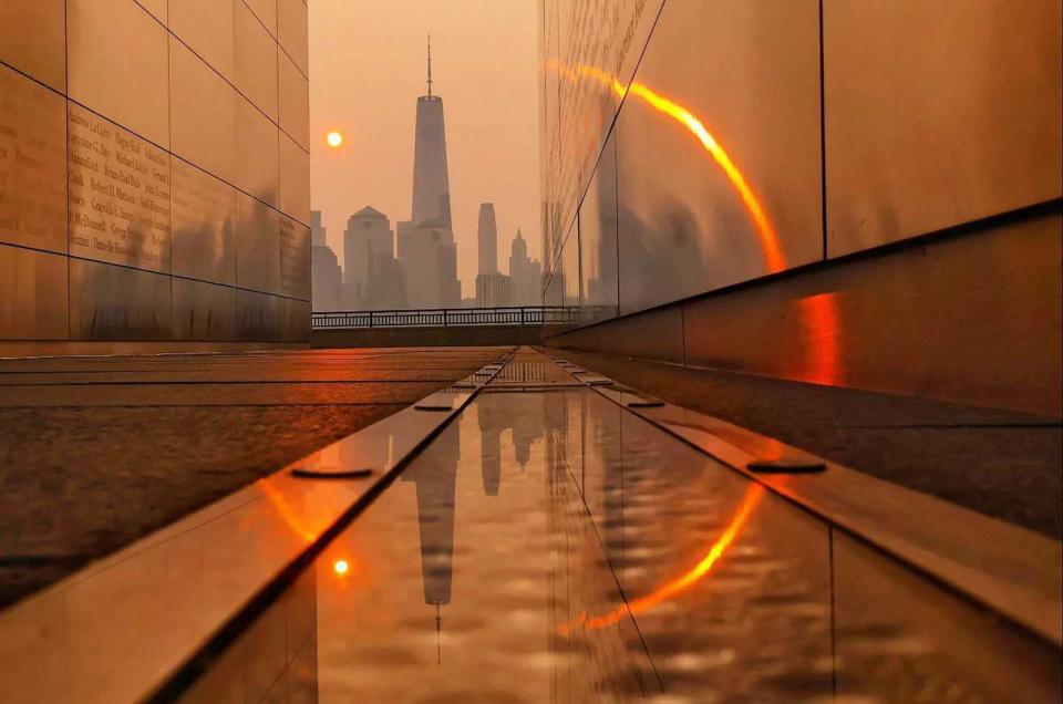 PHOTO: Smoke from wildfires in Canada shrouds the skyline of lower Manhattan in New York City, June 7, 2023.  (Gary Hershorn/ABC News)