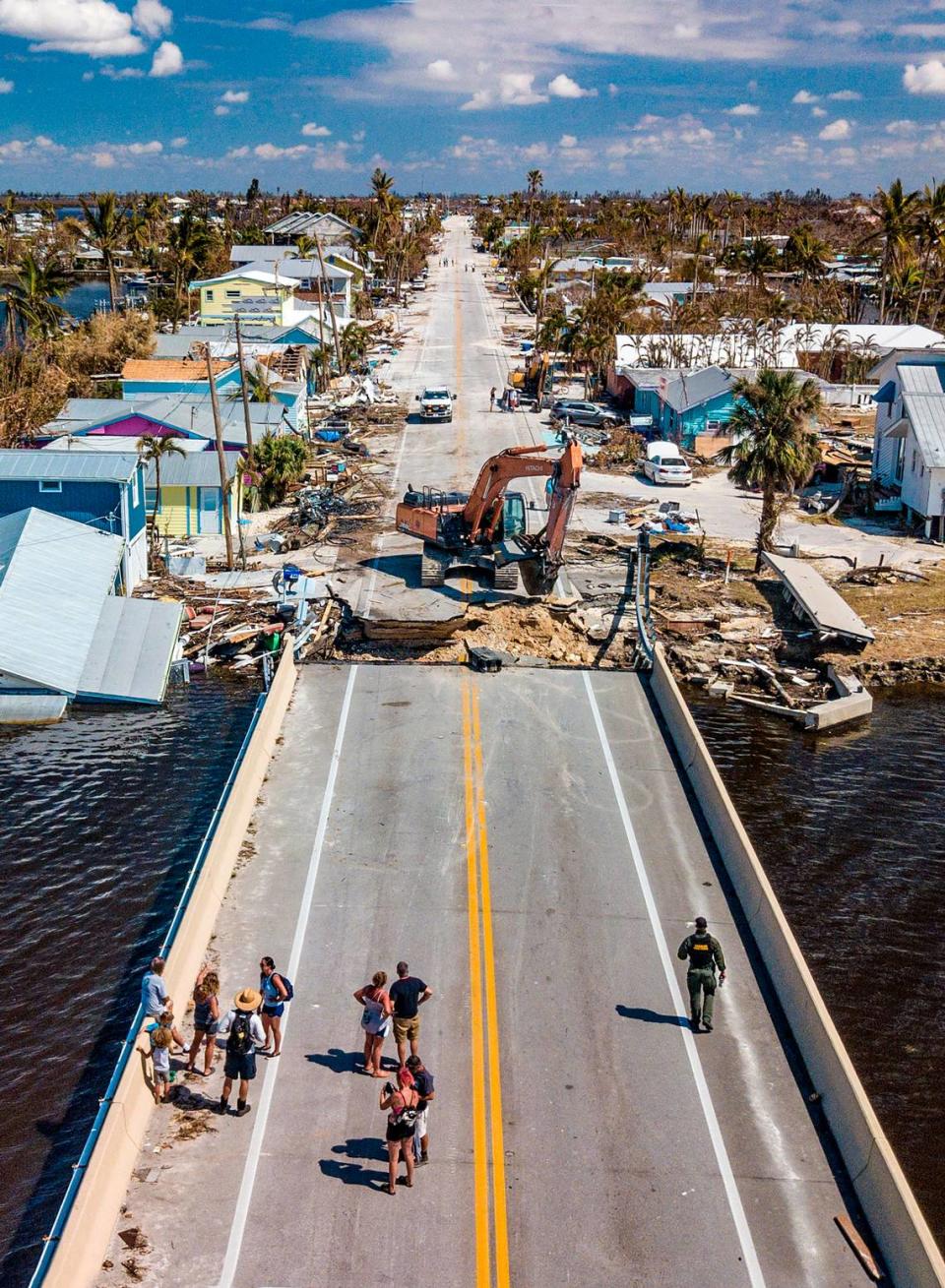 The Matlacha bridge to Pine Island as it’s being repaired on Tuesday, Oct. 4, 2022. Hurricane Ian significantly damaged the roadway leading to the bridge, preventing thousands of residents from Pine Island in Southwest Florida from returning to their homes after they evacuated before the powerful storm hit the area on Wednesday, Sept. 28, 2022. Gov. Ron DeSantis announced Wednesday that the bridge had been temporarily repaired.