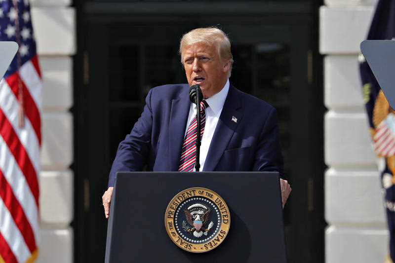 US President Donald Trump speaks during an event on the South Lawn of the White House in Washington.