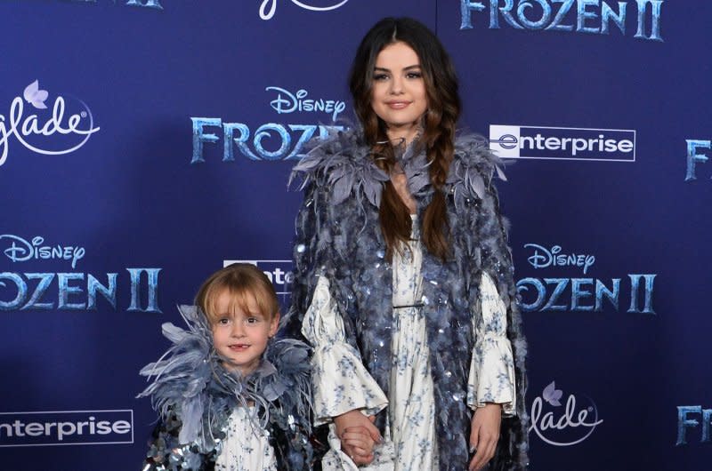 Selena Gomez (R) and her sister Grace Teefey attend the Los Angeles premiere of "Frozen II" in 2019. File Photo by Jim Ruymen/UPI