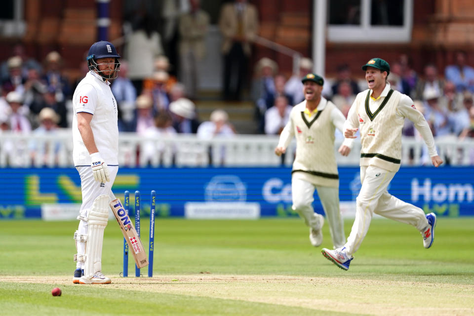 England's Jonny Bairstow (left) looks frustrated after being run out by Australia's Alex Carey (not pictured) as players celebrate during day five of the second Ashes test match at Lord's, London. Picture date: Sunday July 2, 2023. (Photo by Mike Egerton/PA Images via Getty Images)