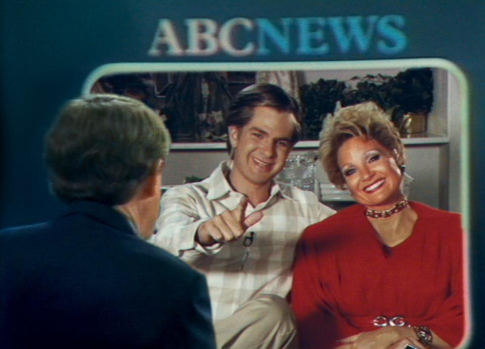 Andrew Garfield, left, and Jessica Chastain re-create a famous interview with the Bakkers in "The Eyes of Tammy Faye."