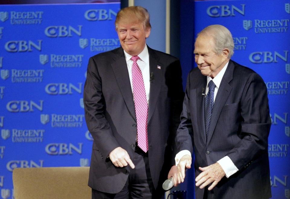 Donald Trump and Pat Robertson at an event in Virginia Beach in 2016 (REUTERS)