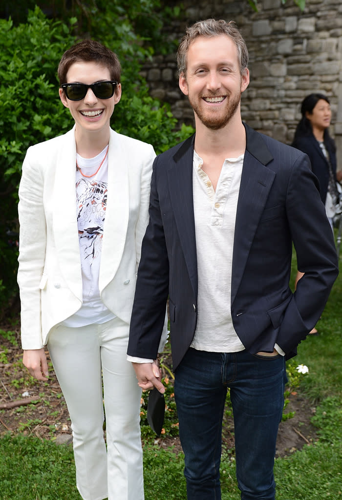 It sounds pretty perfect: A wedding at sunset at a private home in picturesque Big Sur, California ... and it was the wedding Anne Hathaway got to have when she tied the knot with boyfriend of four years, Adam Shulman, on September 29. The “Les Miserables” star wore a dress designed by her pal Valentino for the ceremony, which was held in front of about 180 guests. And while she donned a pixie cut for the occasion (after having to cut her hair for her "Les Mis" role), it wasn't her ideal style for the big day. In a recent interview with <i>The Sun</i>, Hathaway recounted how Shulman kind of proposed: "He said, 'OK, without giving anything away about what is coming in the next few months, how do you feel about being a short-haired bride,' and I went: 'Noooooooooooooo.'"