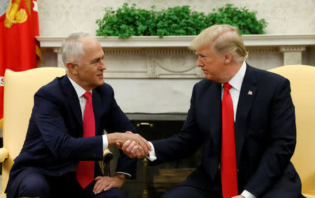 U.S. President Donald Trump meets with Australian Prime Minister Malcolm Turnbull at the White House in Washington, U.S., February 23, 2018. REUTERS/Kevin Lamarque