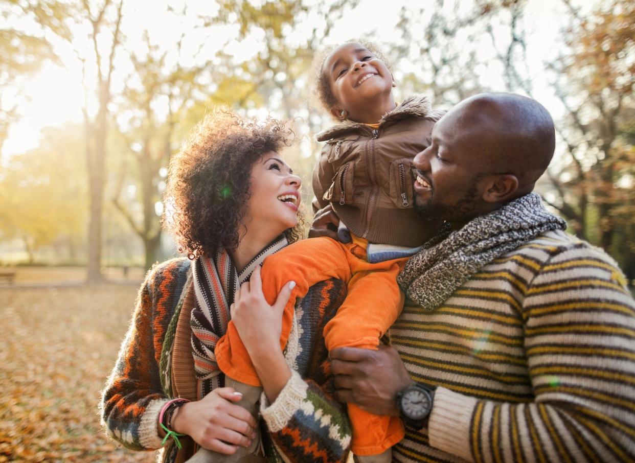Strong, supportive relationships with moms, dads and nonparental caregivers are all vital. <a href="https://www.gettyimages.com/detail/photo/playful-african-american-couple-enjoying-a-day-in-royalty-free-image/538866254" rel="nofollow noopener" target="_blank" data-ylk="slk:skynesher/E+ via Getty Images;elm:context_link;itc:0;sec:content-canvas" class="link ">skynesher/E+ via Getty Images</a>