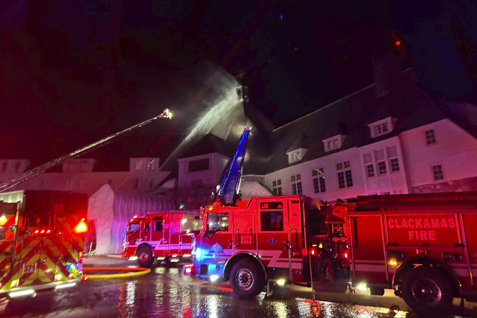 Firefighters extinguish a fire at Oregon's historic Timberline Lodge, which was featured in Stanley Kubrick's 1980 film "The Shining," Thursday evening, April 18, 2024, in Government Camp, Ore. (Clackamas Fire Department via AP)