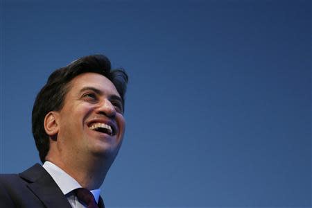 Britain's opposition Labour leader Ed Miliband smiles as he attends the annual Labour party conference in Brighton, southern England September 22, 2013. REUTERS/Stefan Wermuth