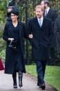 <p>Prince Harry walks arm in arm with Meghan Markle as they make their way into Christmas Day church services. </p>