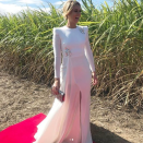 <p>The television presenter stuns in this whimsical white dress designed by Alex Perry which she paired with a Christian Dior clutch. Source: Instagram/Channel9Style </p>