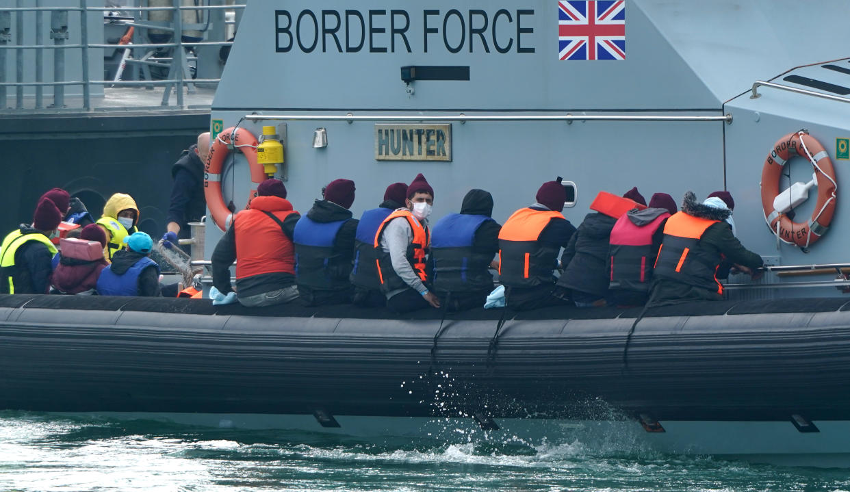 A group of people thought to be migrants are brought in to Dover, Kent, onboard a Border Force vessel, following a small boat incident in the Channel. Picture date: Monday July 26, 2021. (Photo by Gareth Fuller/PA Images via Getty Images)