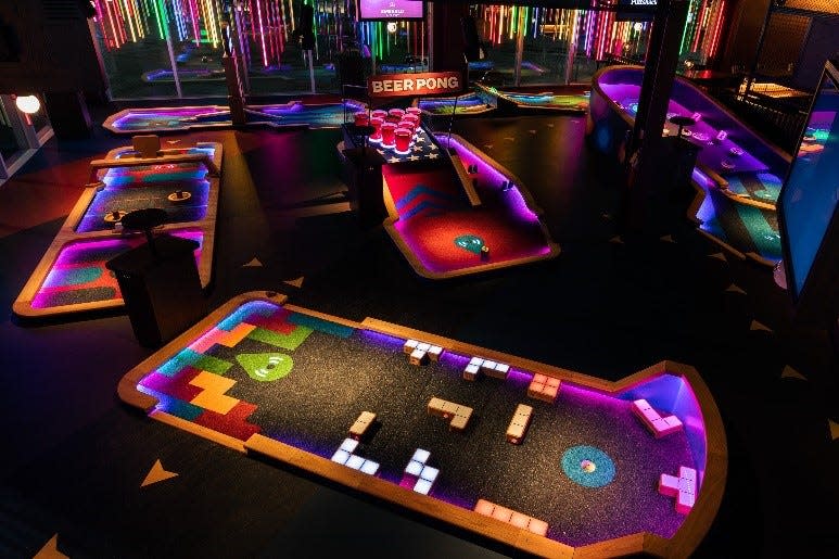 Puttshack, a modern-concept mini-golf attraction that features digital ball tracking, is opening Feb. 10 at the Natick Mall.