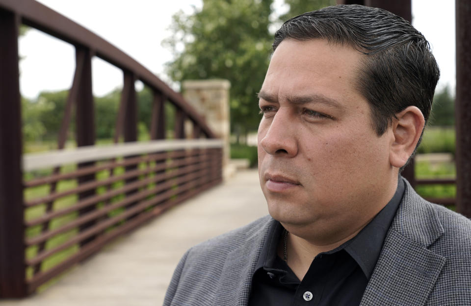 Jose Sagaseta poses for a photograph near his home in Fulshear, Texas, Monday, May 4, 2020. Sagaseta thought his job of eight years with an oilfield services company in Houston was safe. He was laid off in mid-April. Like in other cities, the coronavirus has shut down much of Houston's economic activity, slashing thousands of jobs, while at the same time, the price of oil plunged below zero recently as demand plummeted due to the worldwide lockdown to stop the spread of the virus. (AP Photo/David J. Phillip)