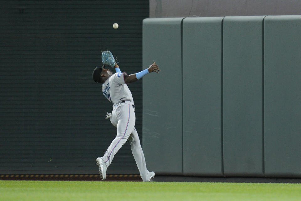 Miami Marlins right fielder Jesus Sanchez catches a ball hit by Baltimore Orioles' Adley Rutschman during the third inning of a baseball game, Friday, July 14, 2023, in Baltimore. (AP Photo/Jess Rapfogel)