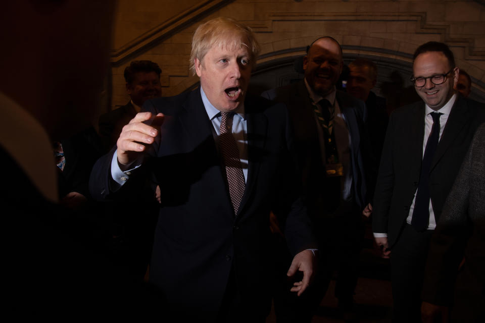 Prime Minister Boris Johnson alongside the newly elected Conservative MPs at the Houses of Parliament in Westminster, London, after the party gained an 80-seat majority in the General Election.