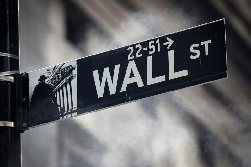 The Wall St. sign is seen outside the NYSE in New York