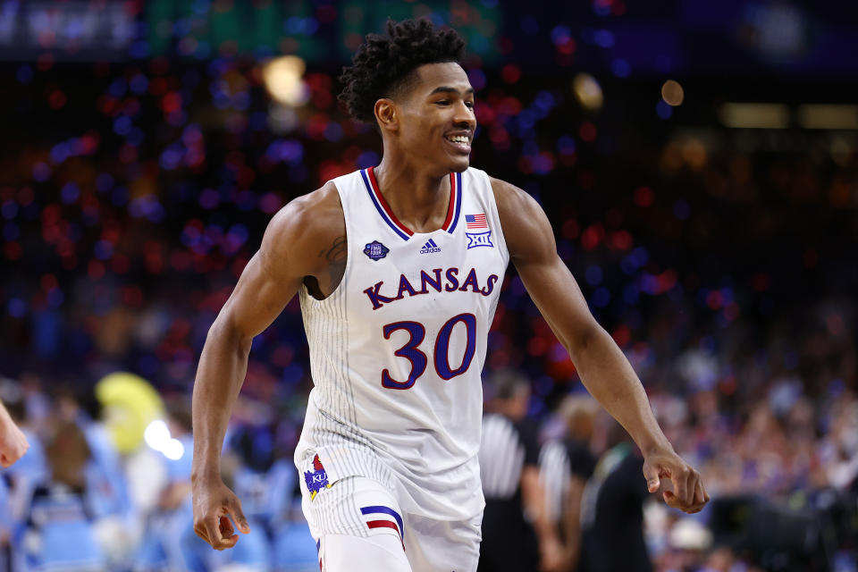 Kansas' Ochai Agbaji celebrates after defeating North Carolina to win the NCAA men's tournament. (Jamie Schwaberow/NCAA Photos via Getty Images)