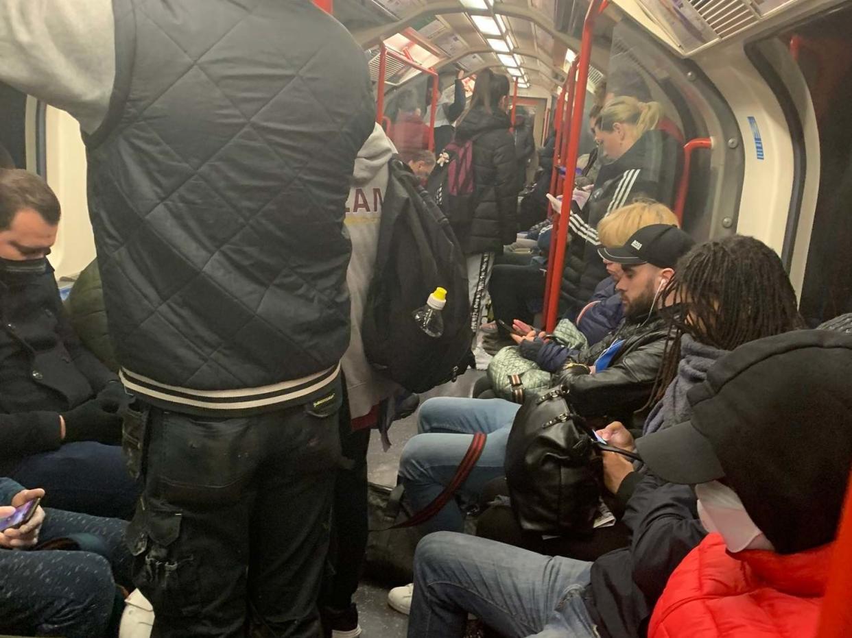 A crowded carriage on a London central line train the day after prime minister Boris Johnson put the UK in lockdown to help curb the spread of coronavirus: @ajadmiah2/PA