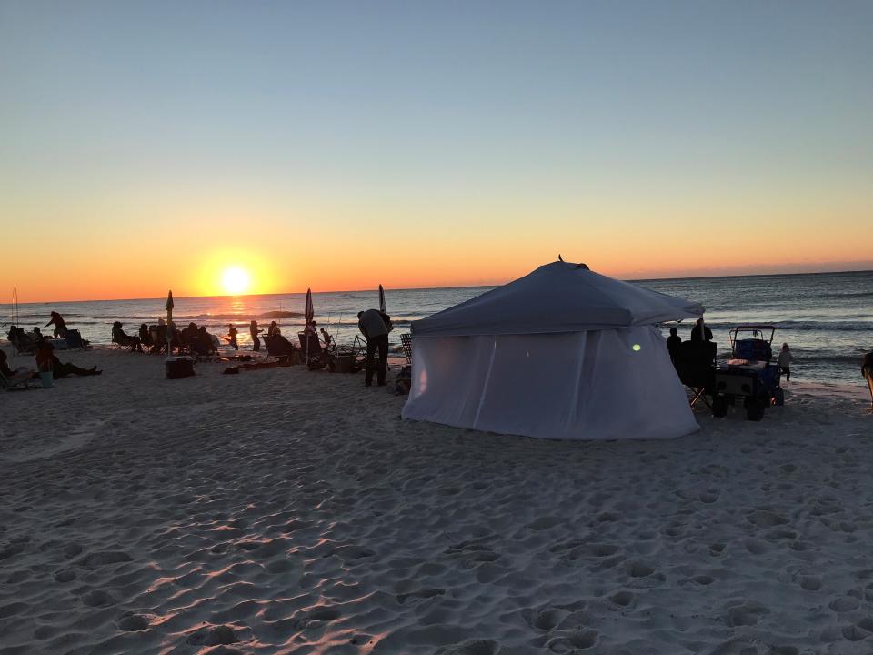 The Reed family set up their tent near the water at Pensacola Beach shortly after arriving at 4:45 a.m. Friday, Nov. 6, 2021, for the Blue Angels Homecoming Air Show.