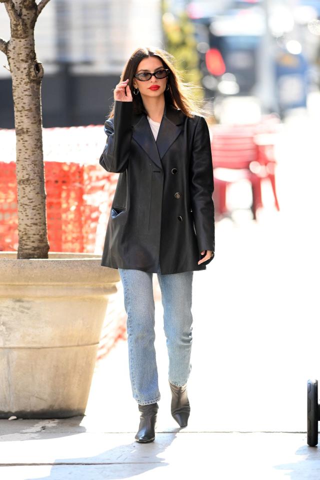 Emily Ratajkowski Channels the 1970s in Denim Jumpsuit & Leather Boots