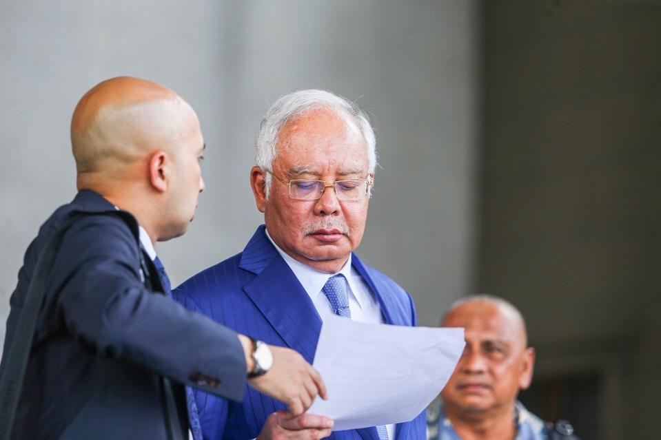 Datuk Seri Najib Razak leaves the Kuala Lumpur Court Complex August 13, 2019. — Picture by Hari Anggara