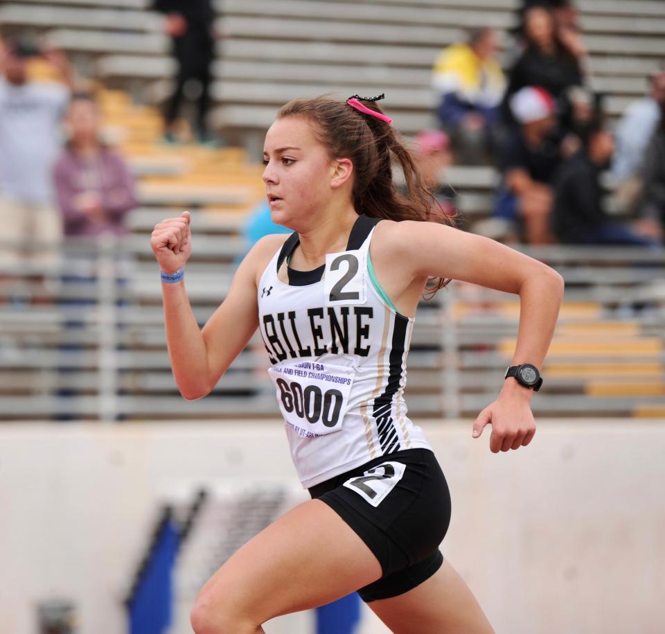 Abilene High's Mason Murray runs in the 3,200 at the Region I-6A track and field meet in Arlington.