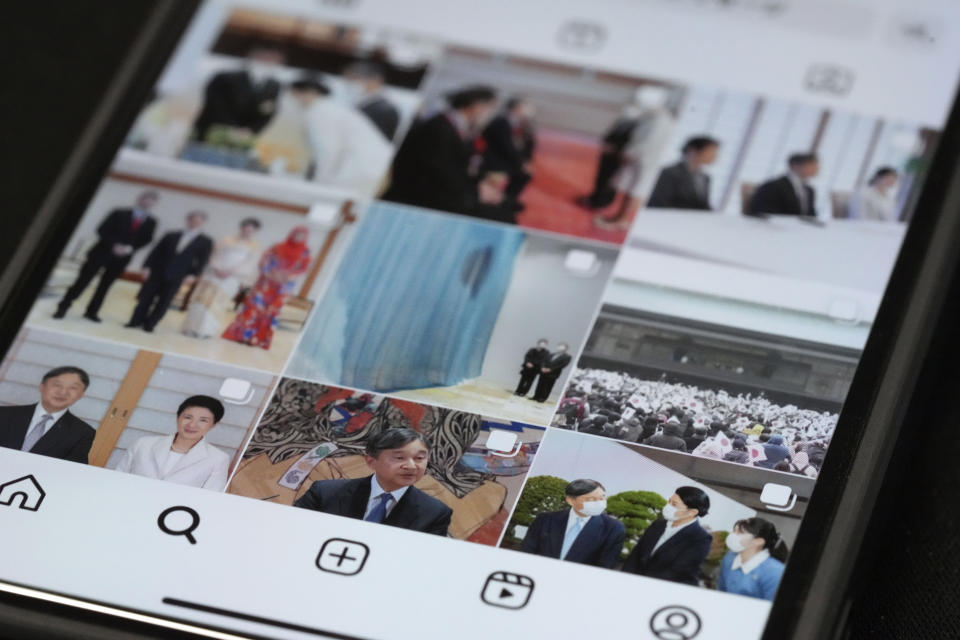 The part of the instagram page of Japan's Imperial Household Agency is seen on a mobile phone Monday, April 1, 2024, in Tokyo. Japan’s Imperial Family made an Instagram debut on Monday, with images of Emperor Naruhito and Empress Masako capturing moments of their official duties, an effort to shake off their cloistered image and reach out to the younger generations.(AP Photo/Eugene Hoshiko)