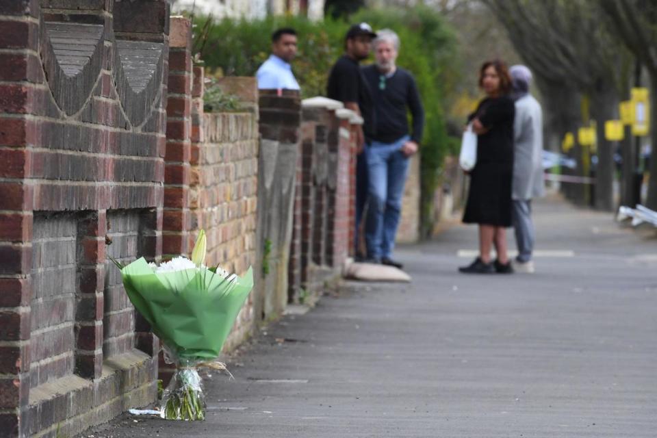 A floral tribute left on Chestnut Avenue where Sami lived (PA)