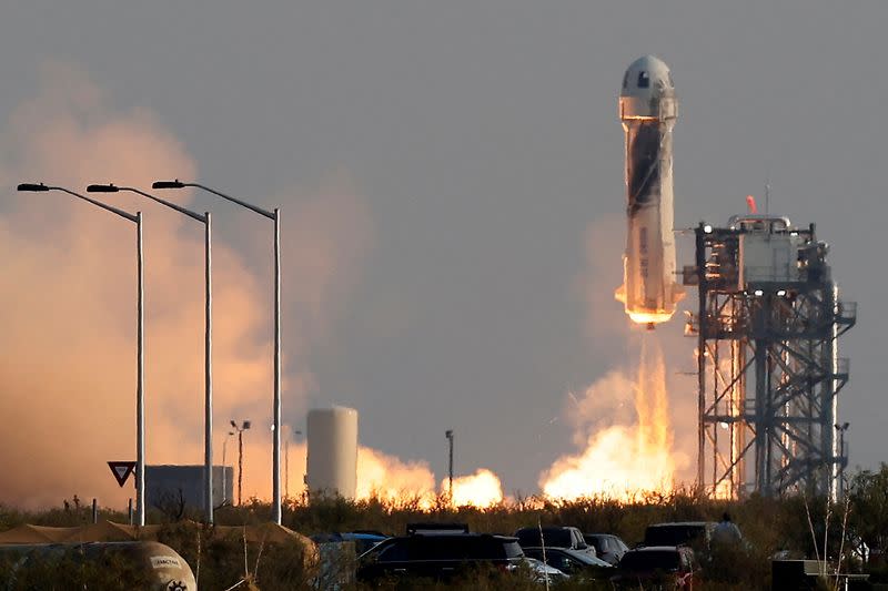 FILE PHOTO: Billionaire businessman Jeff Bezos is launched with three crew members aboard Blue Origin's New Shepard rocket