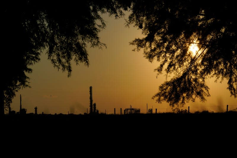 The Denka Performance Elastomer Plant sits at sunset in Reserve, La., Friday, Sept. 23, 2022. Less than a half mile away from the elementary school the plant, which is under scrutiny from federal officials, makes synthetic rubber, emitting chloroprene, listed as a carcinogen in California, and a likely one by the Environmental Protection Agency. - Photo: Gerald Herbert (AP)