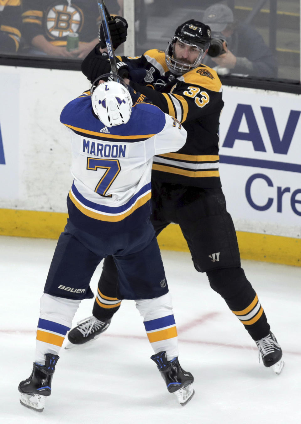 St. Louis Blues' Pat Maroon (7) tangles with Boston Bruins' Zdeno Chara, right, of Slovakia, during the first period in Game 7 of the NHL hockey Stanley Cup Final, Wednesday, June 12, 2019, in Boston. (AP Photo/Charles Krupa)