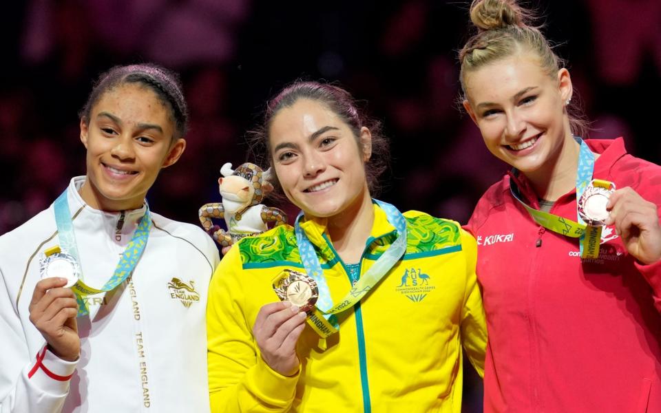 Ondine Achampong on the left with the silver, Australia's Georgia Godwin with the gold and Emma Spence with the bronze - AP