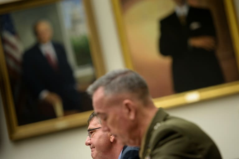 US Secretary of Defense Ashton Carter (L) and Chairman of the Joint Chiefs of Staff General Joseph Dunford testify during a hearing of the House Armed Services Committee on Capitol Hill December 1, 2015