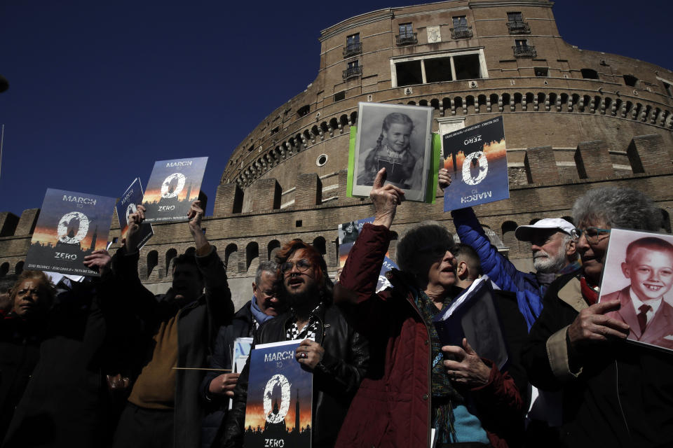 Sex abuse survivors and members of the ECA (Ending Clergy Abuse), march in downtown Rome, Saturday, Feb. 23, 2019. Pope Francis is hosting a four-day summit on preventing clergy sexual abuse, a high-stakes meeting designed to impress on Catholic bishops around the world that the problem is global and that there are consequences if they cover it up. (AP Photo/Alessandra Tarantino)