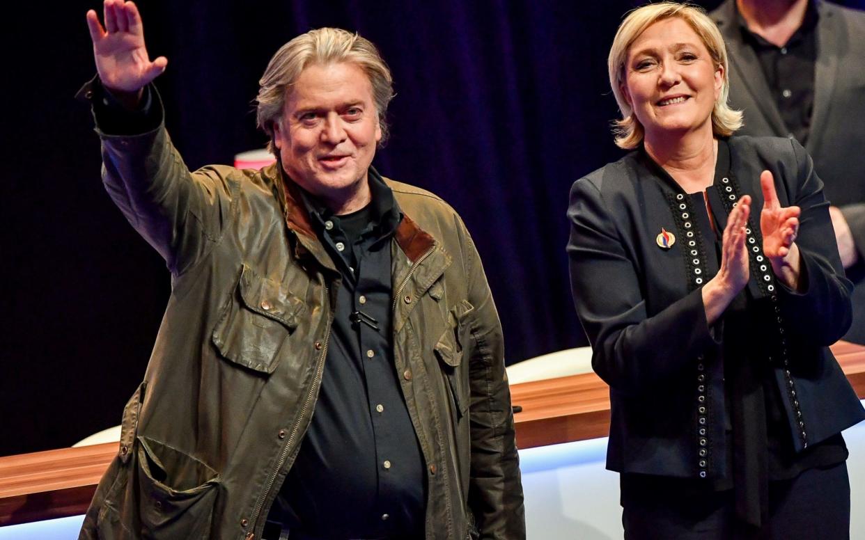 Steve Bannon and Marine Le Pen, pictured in March in Lille - AFP