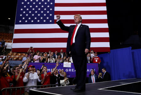 U.S. President Donald Trump gestures good bye at the end of his Make America Great Again rally at Nashville Municipal Auditorium in Nashville, Tennessee, U.S., May 29, 2018. REUTERS/Leah Millis