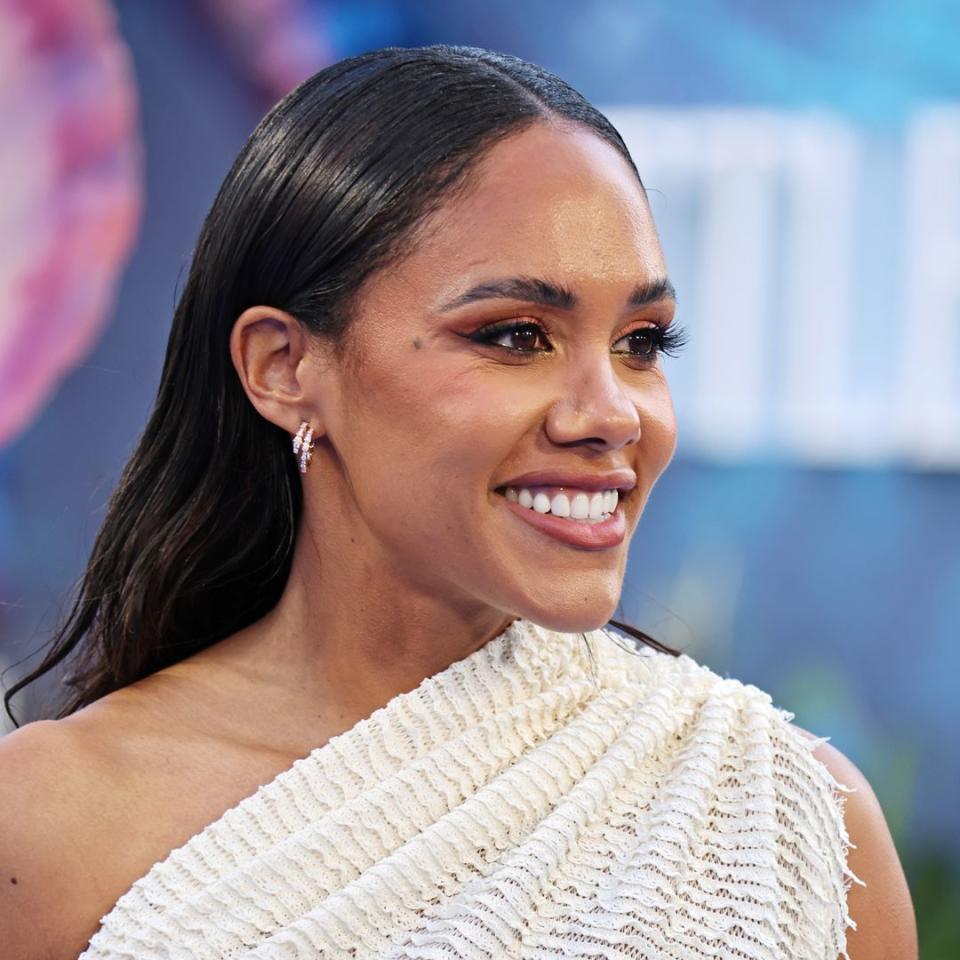 Alex Scott wows in figure-hugging dress for epic reunion