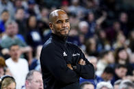 St. Peter's head coach Shaheen Holloway looks on in the second half of an NCAA college basketball game against Monmouth during the championship of the Metro Atlantic Athletic Conference tournament, Saturday, March 12, 2022, in Atlantic City, N.J. St. Peter's won 60-54. (AP Photo/Matt Rourke)