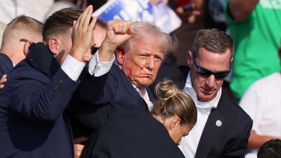 Former US President Donald Trump is rushed off stage by secret service after an incident during a campaign rally at the Butler Farm Show Inc. in Butler, Pennsylvania, USA, 13 July 2024.