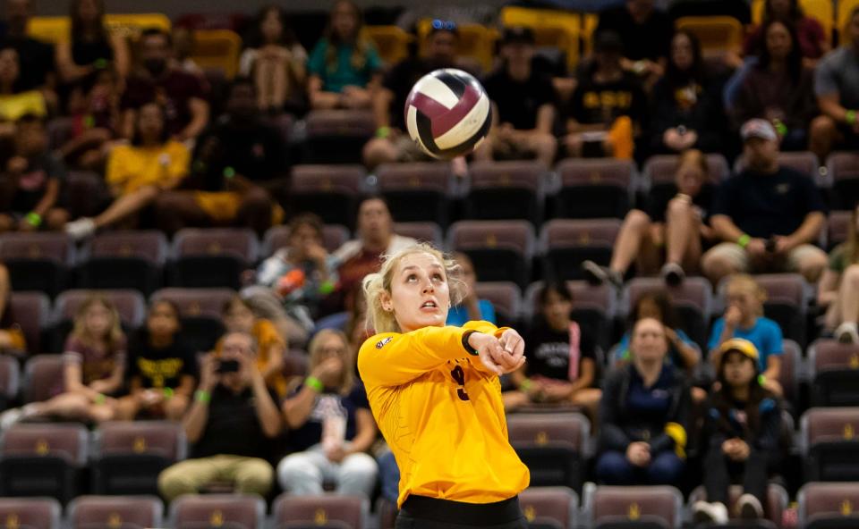 Arizona State Sun Devils women's volleyball setter Shannon Shields (9) hits the ball against the Arizona Wildcats at Mullett Arena in Tempe on Sept. 21, 2023.