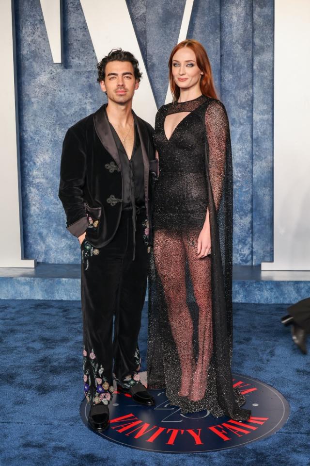 Sophie Turner Sparkles in Sheer Dress & Pumps at Vanity Fair Oscars Party 2023 With Joe Jonas