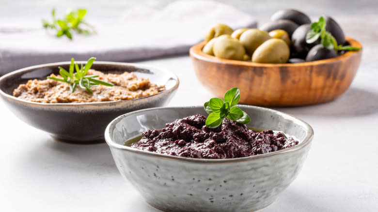 Green and black tapenade in bowls